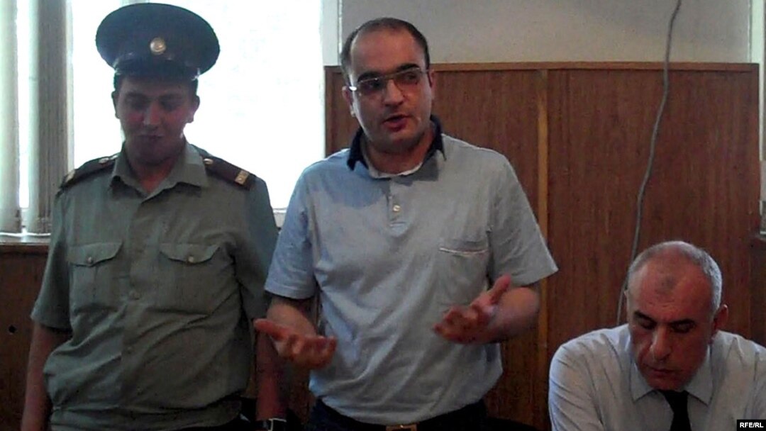 Azerbaijani journalist Eynulla Fatullayev stands trial for possession of drugs in 2010. He was found guilty of the charges, which Amnesty International described as "fabricated," and sentenced to 2 1/2 years imprisonment.