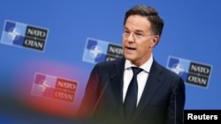 NATO Secretary-General Mark Rutte speaks during a press conference in Brussels on February 11, the day before a NATO defense ministers' meeting in the Belgian capital. 