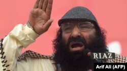 PAKISTAN -- Hizb ul-Mujahideen chief Syed Salahuddin addresses a protest rally against the killings in Indian-administered Kashmir, in Lahore last month.