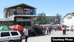 Hundreds of local Kyrgyz gathered in Aravan's central market to demand an investigation into a reported stabbing incident.