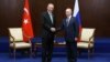 Turkish President Recep Tayyip Erdogan and Russian President Vladimir Putin meet on the sidelines of a regional summit in Astana on October 13.