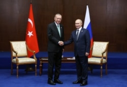 Владимир Путин и Реджеп Эрдоган во время встречи в Астане
