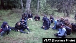 A group of migrants who illegally crossed the Belarusian-Lithuanian border on May 18.