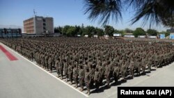 Afghan National Army soldiers attend their graduation ceremony from a three-month training program at the Afghan Military Academy in Kabul last month.