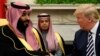 U.S. President Donald Trump shakes hands with Saudi Arabia's Crown Prince Mohammed bin Salman in the Oval Office at the White House in Washington, March 20, 2018