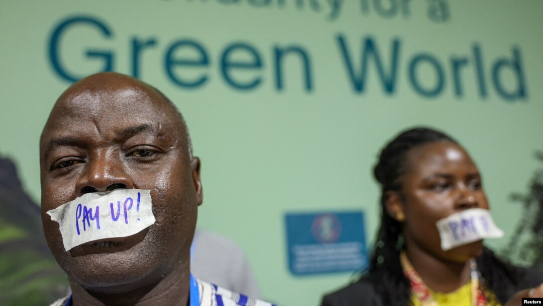 COP29-da inkişaf etmiş ölkələri iqlim dəyişikliyi ilə mübarizə üçün maliyyə ayırmağa çağıran etiraz aksiyası.