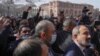 Armenian Prime Minister Nikol Pashinian (right) walks with supporters in central Yerevan. The embattled leader has faced weeks of protests over his handling of the recent conflict with Azerbaijan.&nbsp;