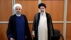 Bivši iranski predsjednik Hasan Rohani i njegov nasljednik Ebrahim Raisi tokom ceremonije inauguracije, Teheran (3. august 2021.)