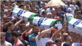 Bosnia-Herzegovina - Bosnians gathered at the memorial center in Potocari on July 11 to bury 19 newly identified victims of Srebrenica 