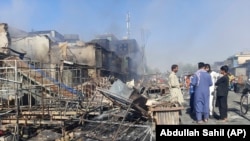 Пошкоджені будівлі, втеча сімей: таліби захопили шість столиць провінцій Афганістану, включаючи Кундуз (фотогалерея)