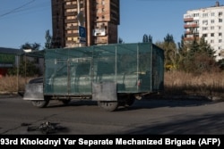 A pickup truck covered with netting in the frontline town of Kostyantynivka on September 22