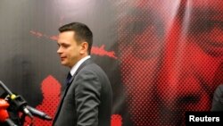 Оьрсийчоь -- «Халкъан кхерамазаллина кхерам» рапорт довзуьйтуш ву Москох оппозицин куьйгалхойх волу политик Яшин Илья. Чиллан-бутт, 23, 2016