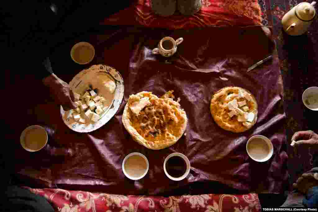 A typical daytime meal for the Pamir Kyrgyz: bread, tea with milk, and rock salt --&nbsp;and sometimes fresh cheese. Evening meals include meat and rice. Malnutrition among&nbsp;the Pamir Kyrgyz stems from a lack of the vitamins that come from fruits and vegetables, which are rare. &nbsp; 