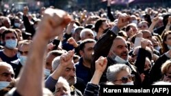 ARMENIA -- People protest outside the government headquarters in Yerevan during a rally against the country's agreement to end fighting with Azerbaijan over Nagorno-Karabakh. November 11, 2020