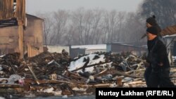 Последствия пожара на рынке "Олжа" в Алматы. 5 марта 2014 года.