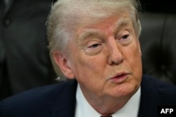 US President Donald Trump speaks to the media at the White House on April 18.