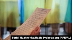 Під час голосування на виборах до Верховної Ради України. Київ, 21 липня 2019 року