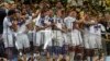 Brazil -- Germany's soccer players celebrate with the World Cup trophy after the 2014 World Cup final between Germany and Argentina at the Maracana stadium in Rio de Janeiro, July 13, 2014