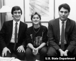 Nadia Comaneci with two U.S. State Department security agents after arriving at Kennedy Airport on December 1, 1989.