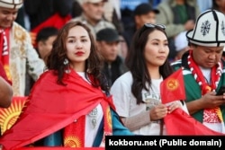 Kyrgyzstan fans cheer for their team during the final between Kyrgyzstan and Kazakhstan in the Kok Boru match at the World Nomad Games on September 12 in Astana.