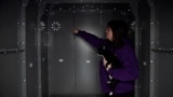 Kateryna Storozhuk shows the Life Capsule home shelter she installed in the spare room of her apartment in Bucha, Ukraine.