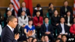 U.S. President Barack Obama addresses a town-hall-style meeting at the Museum of Science and Technology in Shanghai on November 16.