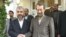 Hamas's Khalid Mishaal (left) with Iranian Supreme National Security Council head Ali Larijani in Tehran in December