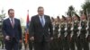 Armenian Defense Minister Vigen Sarkisian (left) and Greek counterpart Panos Kammenos meet in Yerevan on March 29.