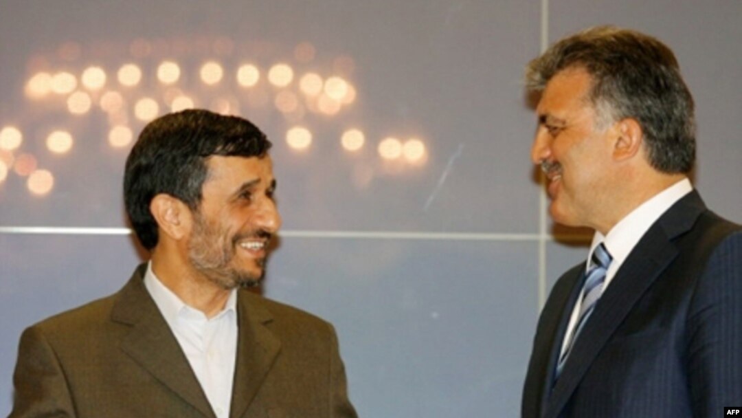 Iranian President Mahmud Ahmadinejad (left) talks with his Turkish counterpart, Abdullah Gul, in Istanbul.