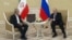 Путин ва Пизишкиён низоъро дар Ховари Миёна баҳс карданд