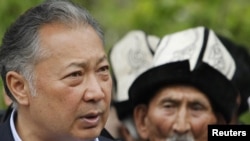 Ousted President Kurmanbek Bakiev talks to his supporters in his home village of Teyit in the southern Jalal-Abad region.