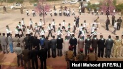 Iraq - Scouts of the Muthanna province celebrate Iraqi Army and Police Day in a parade, Samawa, 09Jan2013