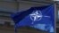 The NATO flag flies over the Lithuanian capital, Vilnius, which is hosting a gathering of the alliance's leaders this week. 
