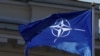 Flamuri i NATO-s valëvitet gjatë kremtimit të 15-vjetorit të anëtarësimit të Lituanisë në NATO. 30 mars 2019.