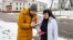 Belarus - RFE/RL journalist Dzmitry Hurnievic donates his books after his presentation was foiled, 08.02.20