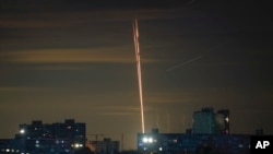 Russian rockets are launched against Ukraine from Russia's Belgorod region, as seen from Kharkiv, on July 16.