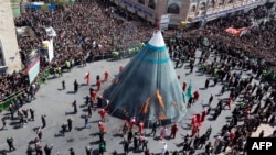 IRAN -- Iranian Shi'ite Muslims burn a tent during the reenactment of the Battle of Karbala, in Tehran, September 10, 2019