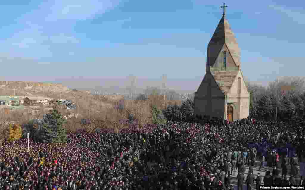 A black-clad crowd masses at Yerevan&#39;s Yerablur military cemetery on December 19.&nbsp;Nearly 3,000 Armenians were killed in the conflict out of a population of 3 million.&nbsp; &nbsp;