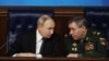 Russian President Vladimir Putin and Chief of the General Staff Valery Gerasimov at a Russian Defense Ministry meeting in Moscow on December 17