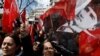 Supporters of the main opposition Republican People's Party wave portraits of Mustafa Kemal Ataturk. File photo