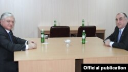 Ukraine - Foreign Ministers Edward Nalbandian (L) of Armenia and Elmar Mammadyarov of Azerbaijan meet in Kiev,04Dec2013