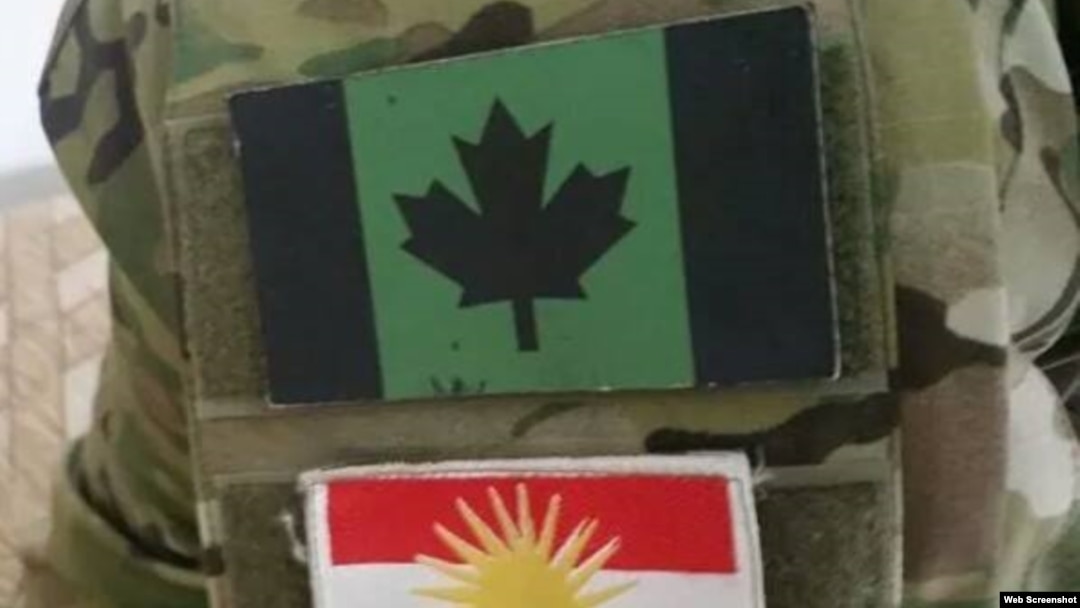 Patches of a variation on the Canadian flag (above) and the Peshmerga flag on the camouflages of a Canadian fighting against Islamic State forces in Syria (undated)