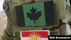 Patches of a variation on the Canadian flag (above) and the Peshmerga flag on the camouflages of a Canadian fighting against Islamic State forces in Syria (undated)