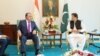 Tajik President Emomali Rahmon (left) and Pakistani Prime Minister Imran Khan met in Islamabad on June 2.