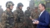 Armenia - Defense Minister Seyran Ohanian (R) awards soldiers on frontline duty.