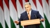 Hungarian Prime Minister Viktor Orban gives a speech in Budapest on November 18 after being re-elected leader at the congress of the governing right-wing Fidesz party.
