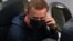 Russian opposition leader Aleksei Navalny is seen in a Pobeda plane after it landed at Moscow's Sheremetyevo airport on January 17.
