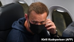 Алексей Навальный в самолете, приземлившемся в аэропорту «Шереметьево», 17 января 2021 года