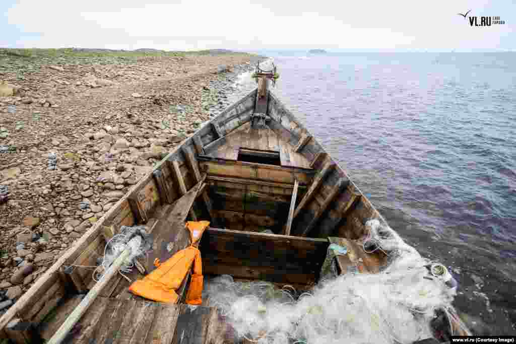 A North Korean fishing vessel discovered on Russky Island by local surfers on August 09. The current wave of stricken vessels washing up on Russian shores may be set to continue.