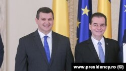 Liderul PMP Eugen Tomac și premierul Ludovic Orban